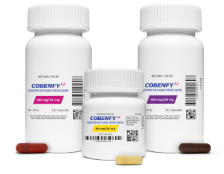 Three white pill bottles, each containing COBENFY at different dosages
