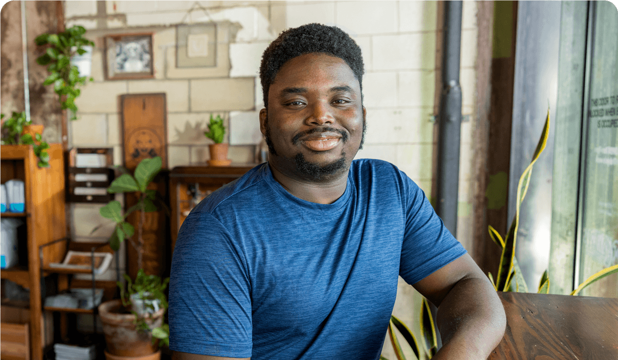 A cheerful man looking directly at the camera